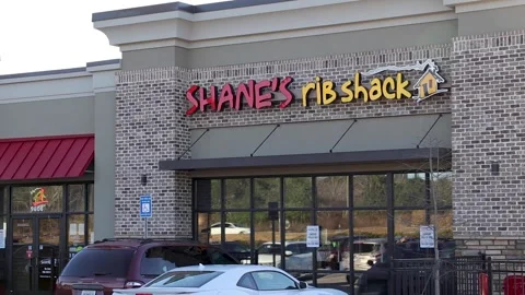 Shanes Rib Shack pan of nail salon and white camera backing out near Horizon  Stock Footage 152345448
