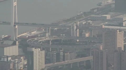 Shanghai Bund highway loop from World Financial Center teleshot Stock Footage 2976418