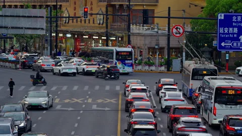 Shanghai China City Traffic Intersection Urban Street Dusk Lights Jingan Temple 스톡 동영상 336773254