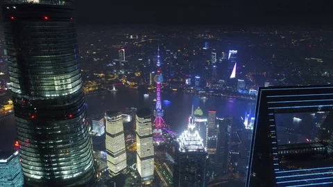 SHANGHAI, CHINA - MAY 5, 2017 Aerial drone video, night time illuminated famous Stock Footage 86831223