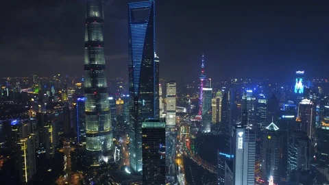 SHANGHAI, CHINA - MAY 5, 2017 Aerial drone video, night time illuminated famous Stock Footage 86831423