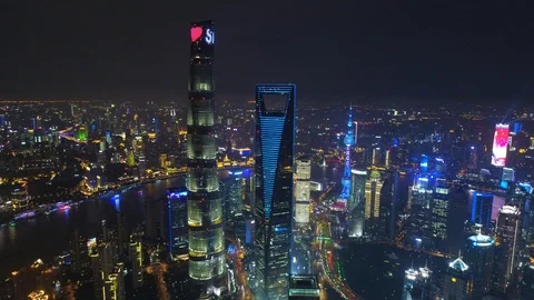 SHANGHAI, CHINA - MAY 5, 2017 Aerial drone video, night time illuminated famous Stock Footage 86831643