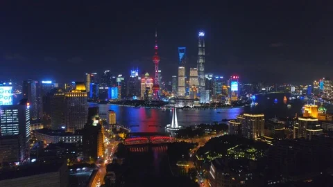 SHANGHAI, CHINA - MAY 5, 2017 Aerial drone video, night time illuminated famous Stock Footage 86831720