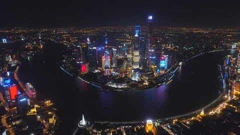 SHANGHAI, CHINA - MAY 5, 2017 Aerial drone video, night time illuminated famous Stock Footage 86832672