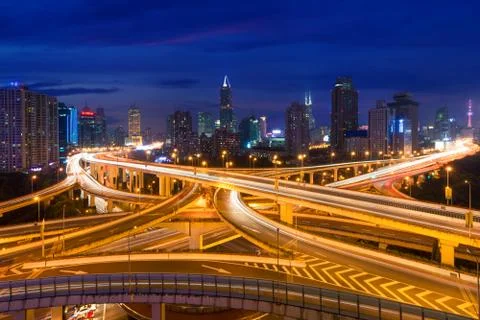 Shanghai elevated road junction and interchange overpass at night in Shanghai Stock Photos