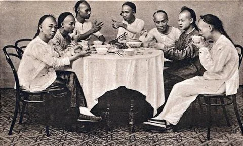 Shanghai, Gruppe von Männern, Geschäftsleute, bei gemeinsamen Essen, 1920,. Stock Photos