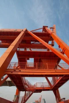 Shanghai harbor with red cranes Stock Photos