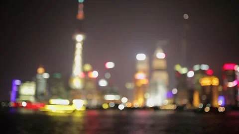 SHANGHAI - MARCH 19, 2018: Defocused of of Pudong embankment at night,Brightly Stock Footage 107052460