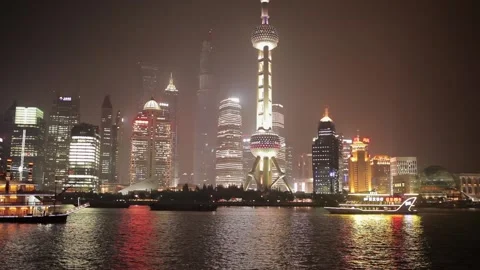 SHANGHAI - MARCH 19, 2018: View of Pudong embankment at night,Brightly Stock Footage 107039101