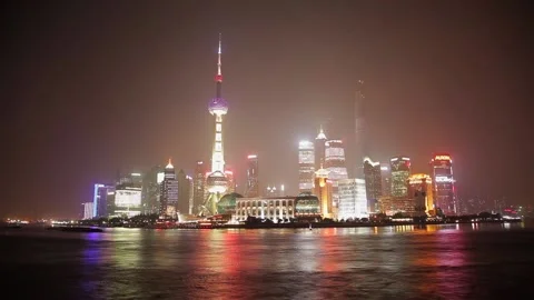 SHANGHAI - MARCH 19, 2018: View of Pudong embankment at night,Brightly Stock Footage 107040029