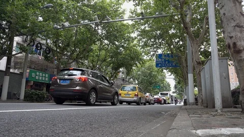 Shanghai morning car queue in front of red light Stock Footage 124601480