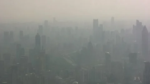 Shanghai skyline covered in smog Stock Footage