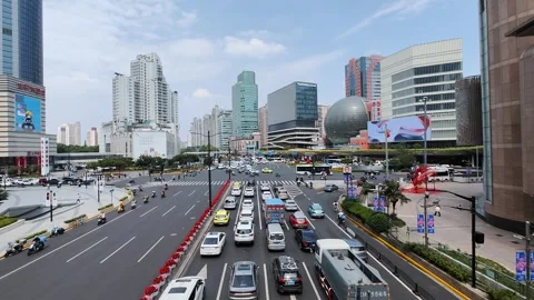 Shanghai skyline Xujiahui busy intersection traffic 4k with ambulance siren Stock Footage 249927945
