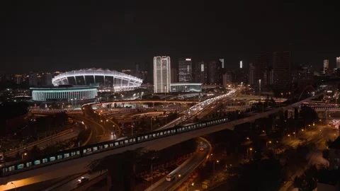 Shanghai Stadium NIGHT W. TRAIN FULL Stock Footage 240846252