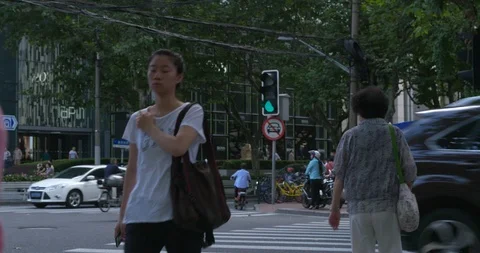 Shanghai traffic, city intersection, slow motion Stock Footage 113901549