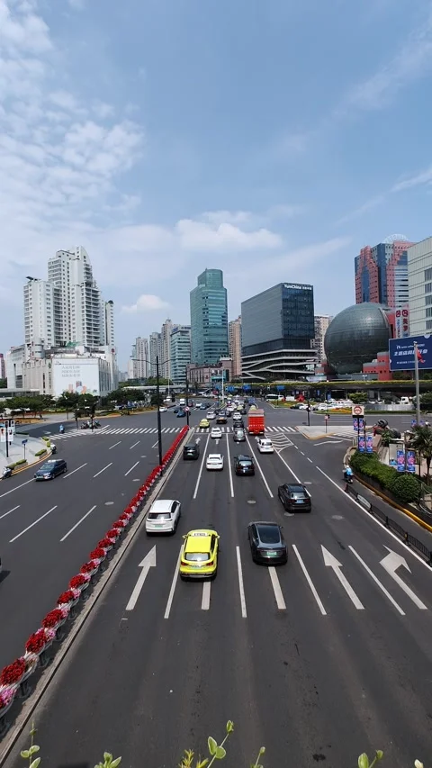 Shanghai Xujiahui busy intersection traffic and modern buildings skyline Stock Footage 249927879