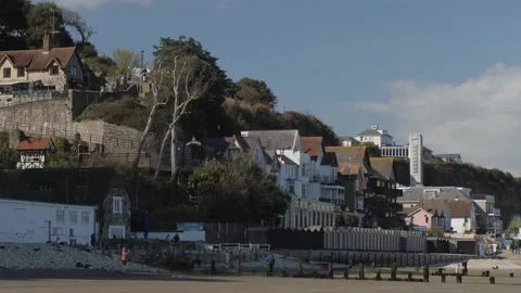 Shanklin seafront from Luccombe end, cliff lift in distance, panned view L-R Stock Footage 238725241