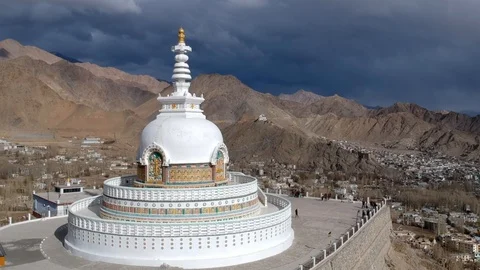 Shanti Stupa is a Buddhist white-domed stupa (chorten) on a hilltop in Chanspa,  Stock Footage