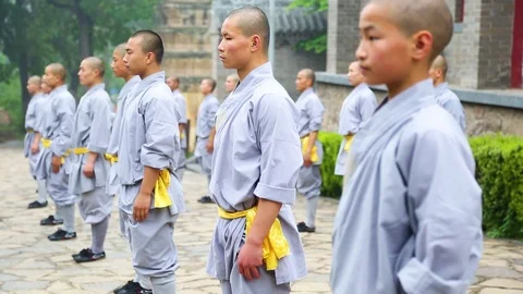 Shaolin monks relaxing in between the Kung fu training session Stock-Footage 88676872
