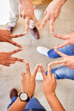 Shape, above and hands of business people in a star for team building, peace and Stock Photos