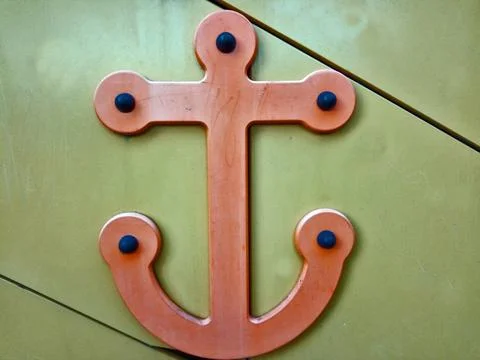 The shape of an anchor on a green background Stock Photos
