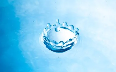 Shape of drop of water splash Stock Photos