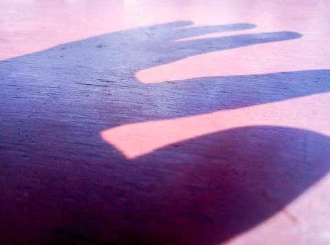 The shape of a finger's shadow Stock Photos