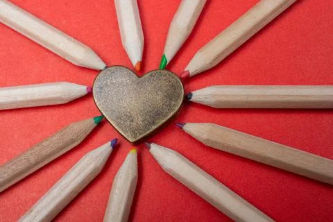 Shape of heart formed by colored pencils heart icon for Valentines Day Stock Photos