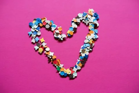 Shape of a heart made from confetti Stock Photos