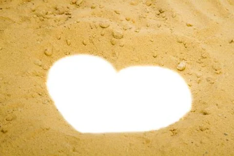 Shape of heart into a sand Stock Photos