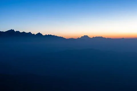 Shape of himalayan range at early morning from Pikey peak. Kangchenjunga mo.. Stock Illustration