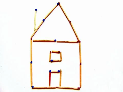 The shape of a house made of matches 写真素材