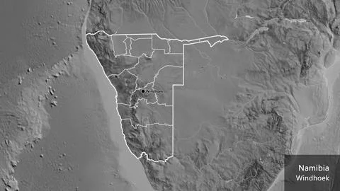 Shape of Namibia with regional borders. Grayscale. Labels Stock Illustration