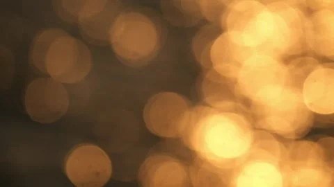 The shape of the yellow bokeh circle sparkles with sunlight in the lake wate Stock Footage 280690129