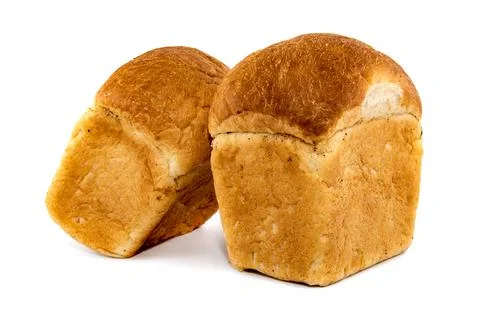 Shaped white wheat bread on a white background. Bakery products. Loaf Stock Photos