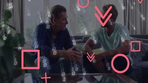 Shapes and binary code appearing, father gesturing on sofa and son listening for Stock Footage 312407377