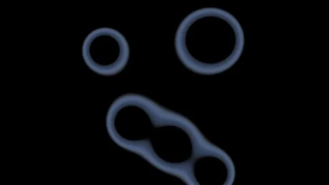 Shapes and patterns appear on a dark background in motion Stock Footage 338230224