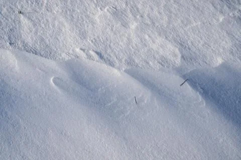 Shapes, textures, patterns created by snow and wind. Stock Photos