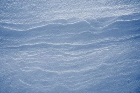 Shapes, textures, patterns created by snow and wind. Stock Photos