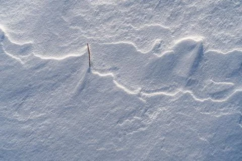 Shapes, textures, patterns created by snow and wind. Stock Photos