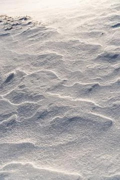 Shapes, textures, patterns created by snow and wind. Stock Photos