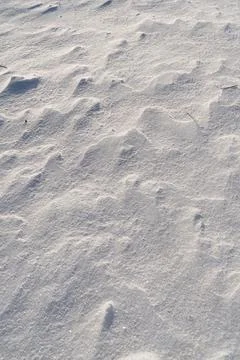 Shapes, textures, patterns created by snow and wind. Stock Photos