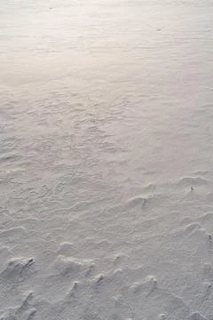 Shapes, textures, patterns created by snow and wind. Stock Photos