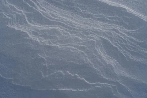 Shapes, textures, patterns created by snow and wind. Stock-Fotos