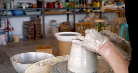 Shaping Clay in Potter's Hands Stock Footage 329307307