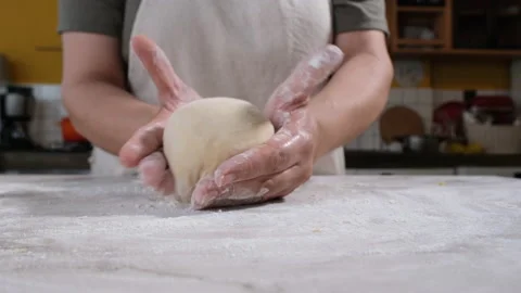 Shaping dough for pizza Stock Footage 205081460