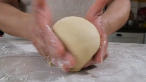 Shaping dough for pizza Stock Footage 205082313