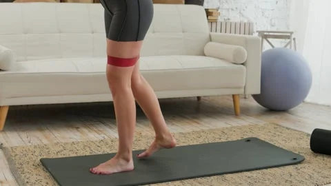 Shaping figure and training buttocks. View of legs of young fit woman doing Vídeos de archivo 304056243