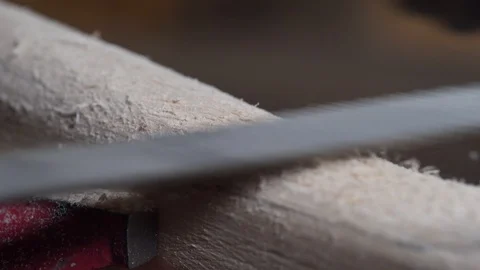 Shaping the handle of an axe Stock Footage 129694163