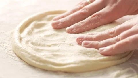 Shaping Pizza Dough Base. Stock Footage 270534713